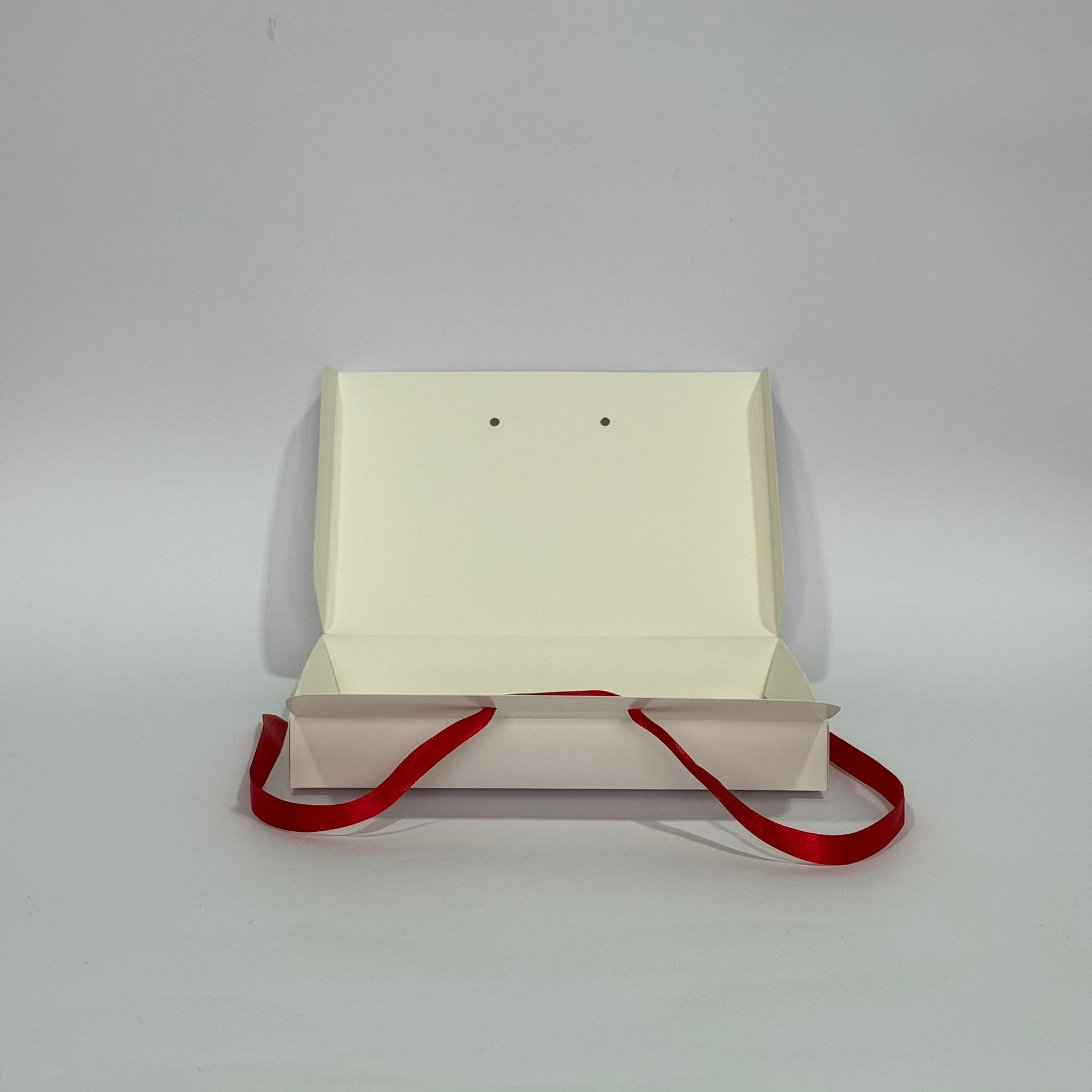 Caja vela con cinta