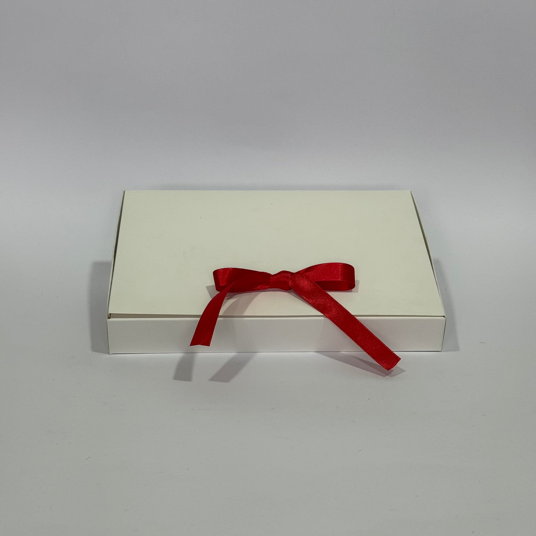 Caja vela con cinta