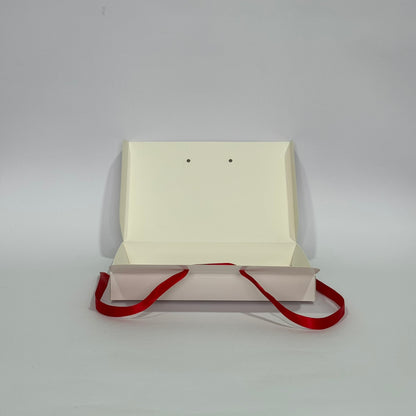 Caja vela con cinta